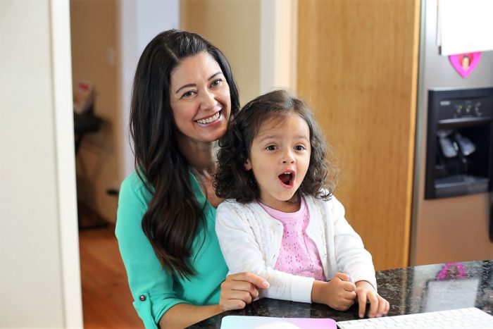 Mother and daughter enjoying themselves.